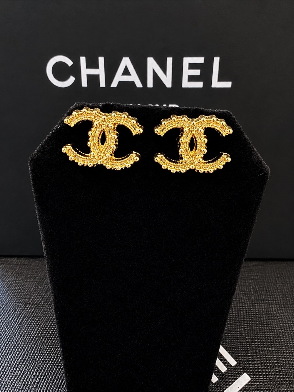 CHANEL Gold Textured CC Logo Stud Earrings
